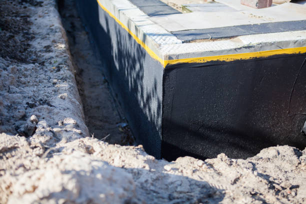 Professional Interior Drainage System technician working in Yorktown, IN